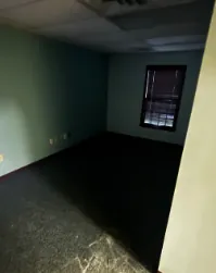 The same room with unwanted furniture and contents removed