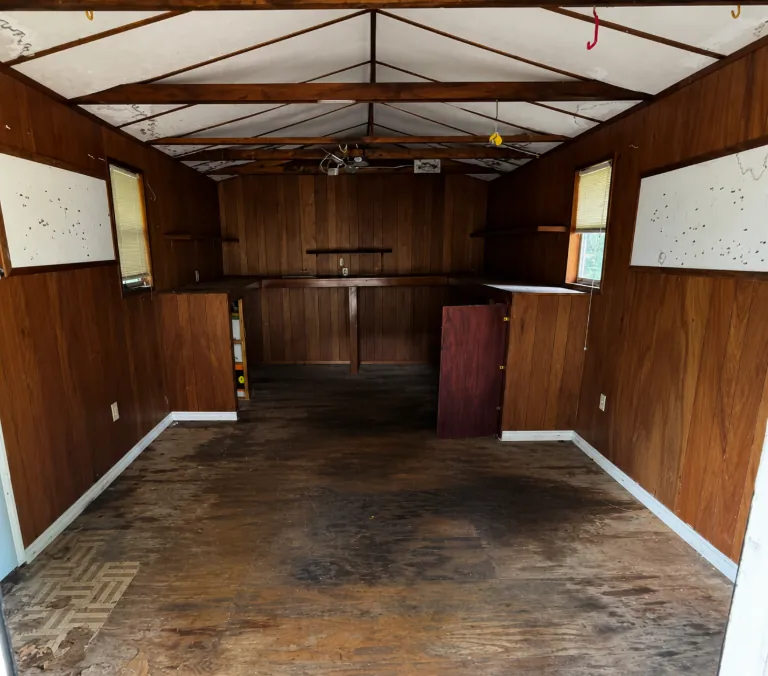The shed interior with the contents cleared